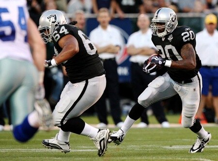OAKLAND, CA - AUGUST 13:  Darren McFadden #20 of the Oakland Raiders runs the ball against the Dallas Cowboys during the preseason game at Oakland-Alameda County Coliseum on August 13, 2009 in Oakland, California. <br /><br /><span class="help">(Photo by Jed Jacobsohn/Getty Images)</span>