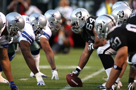 OAKLAND, CA - AUGUST 13:  Samson Satele #64 of the Oakland Raidersl lines up at center against the Dallas Cowboys during a preseason game at Oakland-Alameda County Coliseum on August 13, 2009 in Oakland, California.  <br /><br /><span class="help">(Photo by Jed Jacobsohn/Getty Images)</span>