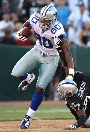 OAKLAND, CA - AUGUST 13: Martellus Bennett #80 of the Dallas Cowboys runs with the ball after catching  a pass over Chris Johnson #37 of the Oakland Raiders during a preseason game at Oakland-Alameda County Coliseum on August 13, 2009 in Oakland, California.  <br /><br /><span class="help">(Photo by Jed Jacobsohn/Getty Images)</span>