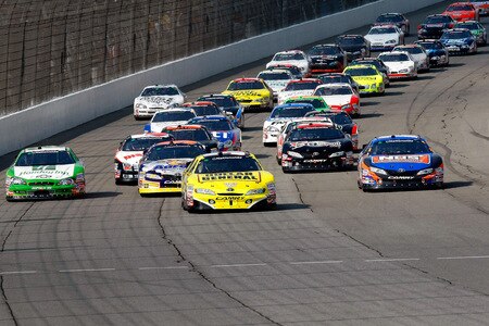 BROOKLYN, MI - AUGUST 15:  Brian Vickers (C), driver of the #32 Dollar General Stores Toyota, leads the field at the start of the NASCAR Nationwide Series at Michigan International Speedway on August 15, 2009 in Brooklyn, Michigan.  <br /><br /><span class="help">(Photo by Jason Smith/Getty Images)</span>