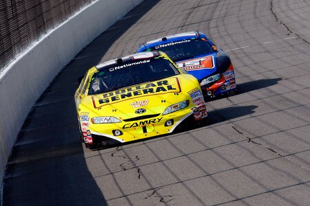 BROOKLYN, MI - AUGUST 15:  Brian Vickers, driver of the #32 Dollar General Stores Toyota, leads Kyle Busch, driver of the #18 NOS Toyota, during the NASCAR Nationwide Series at Michigan International Speedway on August 15, 2009 in Brooklyn, Michigan.  <br /><br /><span class="help">(Photo by Jason Smith/Getty Images)</span>