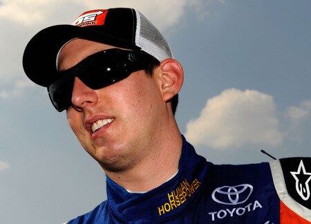 BROOKLYN, MI - AUGUST 15:  Kyle Busch, driver of the NOS Toyota, looks on from the grid, during the NASCAR Nationwide Series at Michigan International Speedway on August 15, 2009 in Brooklyn, Michigan.  <br /><br /><span class="help">(Photo by Rusty Jarrett/Getty Images for NASCAR)</span>