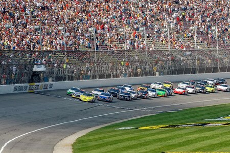 BROOKLYN, MI - AUGUST 15:  Brian Vickers (C - yellow car), driver of the #32 Dollar General Stores Toyota, leads the field at the start of the NASCAR Nationwide Series at Michigan International Speedway on August 15, 2009 in Brooklyn, Michigan.  <br /><br /><span class="help">(Photo by Jason Smith/Getty Images)</span>
