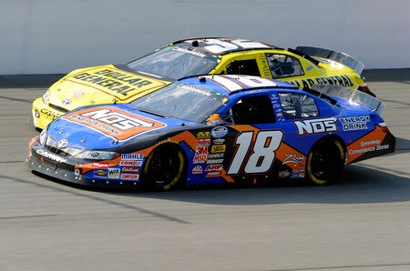BROOKLYN, MI - AUGUST 15:  Kyle Busch, driver of the #18 NOS Toyota, rides side by each against Brian Vickers, driver of the #32 Dollar General Stores Toyota, during the NASCAR Nationwide Series at Michigan International Speedway on August 15, 2009 in Brooklyn, Michigan.  <br /><br /><span class="help">(Photo by John Harrelson/Getty Images for NASCAR)</span>