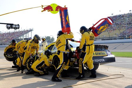 BROOKLYN, MI - AUGUST 15: Brian Vickers, driver of the #32 Dollar General Toyota, makes a pit stop during the NASCAR Nationwide Series at Michigan International Speedway on August 15, 2009 in Brooklyn, Michigan.  <br /><br /><span class="help">(Photo by John Harrelson/Getty Images for NASCAR)</span>