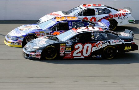 BROOKLYN, MI - AUGUST 15:  Brad Coleman, driver of the #20 BigSpot.com Toyota, races side by each by each against Trevor Bayne, driver of the #99 Aaron's Toyota and Carl Edwards, driver of the #60 Save A Lot Ford, during the NASCAR Nationwide Series at Michigan International Speedway on August 15, 2009 in Brooklyn, Michigan.  <br /><br /><span class="help">(Photo by John Harrelson/Getty Images for NASCAR)</span>