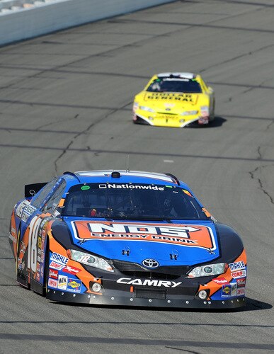 BROOKLYN, MI - AUGUST 15:  Kyle Busch, driver of the #18 NOS Toyota, leads Brian Vickers, driver of the #32 Dollar General Stores Toyota, during the NASCAR Nationwide Series at Michigan International Speedway on August 15, 2009 in Brooklyn, Michigan.  <br /><br /><span class="help">(Photo by Harry How/Getty Images)</span>