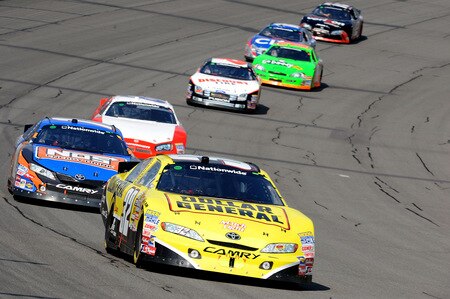 BROOKLYN, MI - AUGUST 15:  Brian Vickers, driver of the #32 Dollar General Stores Toyota, leads a pack of cars during the NASCAR Nationwide Series at Michigan International Speedway on August 15, 2009 in Brooklyn, Michigan.  <br /><br /><span class="help">(Photo by Harry How/Getty Images)</span>