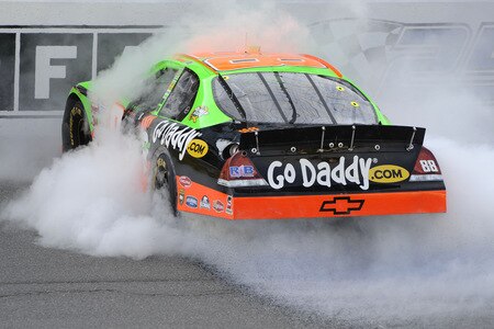 BROOKLYN, MI - AUGUST 15:  Brad Keselowski, driver of the #88 GoDaddy Chevrolet, performs a burnout after winning the NASCAR Nationwide Series at Michigan International Speedway on August 15, 2009 in Brooklyn, Michigan.  <br /><br /><span class="help">(Photo by John Harrelson/Getty Images for NASCAR)</span>