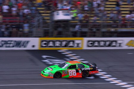 BROOKLYN, MI - AUGUST 15:  Brad Keselowski, driver of the #88 GoDaddy Chevrolet, takes the checkered flag as he crosses the start finish/line to win the NASCAR Nationwide Series at Michigan International Speedway on August 15, 2009 in Brooklyn, Michigan.  <br /><br /><span class="help">(Photo by Jason Smith/Getty Images)</span>