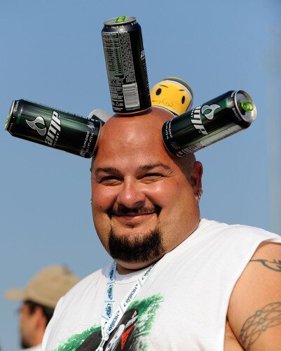 BROOKLYN, MI - AUGUST 16:  A fan with cans of AMP stuck to his head looks on during the NASCAR Sprint Cup Series CARFAX 400 at Michigan International Speedway on August 16, 2009 in Brooklyn, Michigan.  <br /><br /><span class="help">(Photo by Rusty Jarrett/Getty Images for NASCAR)</span>