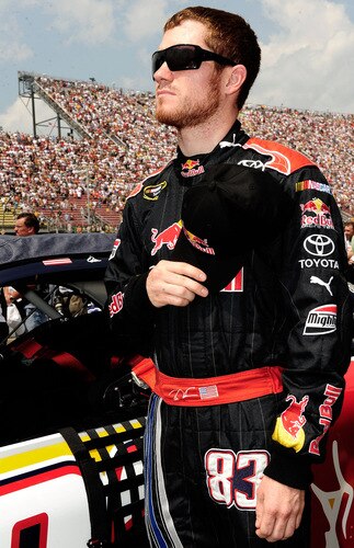 BROOKLYN, MI - AUGUST 16:  Brian Vickers, driver of the #83 of the Red Bull Toyota, stands on the grid during the National Anthem prior to the start of the NASCAR Sprint Cup Series CARFAX 400 at Michigan International Speedway on August 16, 2009 in Brooklyn, Michigan.  <br /><br /><span class="help">(Photo by Rusty Jarrett/Getty Images for NASCAR)</span>