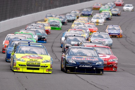 BROOKLYN, MI - AUGUST 16:  Mark Martin (L), driver of the #5 Kellogg's / CARQUEST Chevrolet and Brian Vickers, driver of the #83 Red Bull Toyota, lead the field at the start of the NASCAR Sprint Cup Series CARFAX 400 at Michigan International Speedway on August 16, 2009 in Brooklyn, Michigan.  <br /><br /><span class="help">(Photo by Jason Smith/Getty Images)</span>