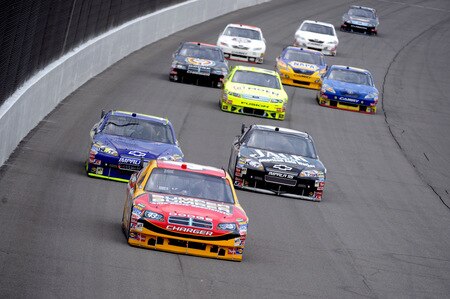 BROOKLYN, MI - AUGUST 16:  Reed Sorenson, driver of the #43 Auto Valve Bumper to Bumper Dodge, leads a pack of cars during the NASCAR Sprint Cup Series CARFAX 400 at Michigan International Speedway on August 16, 2009 in Brooklyn, Michigan.  <br /><br /><span class="help">(Photo by Harry How/Getty Images)</span>