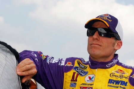 BROOKLYN, MI - AUGUST 16:  Jamie McMurray, driver of the #26 CROWN ROYAL Ford, looks on from the grid prior to the start of the NASCAR Sprint Cup Series CARFAX 400 at Michigan International Speedway on August 16, 2009 in Brooklyn, Michigan.  <br /><br /><span class="help">(Photo by Jason Smith/Getty Images)</span>
