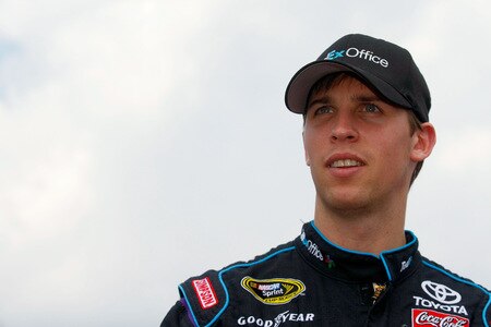 BROOKLYN, MI - AUGUST 16:  Denny Hamlin, driver of the #11 FedEx Office Toyota, looks on from the grid during the NASCAR Sprint Cup Series CARFAX 400 at Michigan International Speedway on August 16, 2009 in Brooklyn, Michigan.  <br /><br /><span class="help">(Photo by Jason Smith/Getty Images)</span>