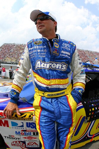 BROOKLYN, MI - AUGUST 16:  David Reutimann, driver of the Aaron's Dream Machine Toyota, looks on from the grid during the NASCAR Sprint Cup Series CARFAX 400 at Michigan International Speedway on August 16, 2009 in Brooklyn, Michigan.  <br /><br /><span class="help">(Photo by Jason Smith/Getty Images)</span>