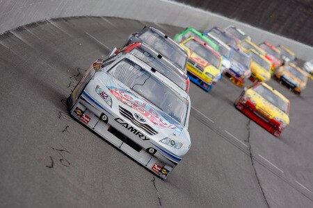 BROOKLYN, MI - AUGUST 16:  Scott Speed, driver of the #82 Red Bull Toyota, leads a pack of cars during the NASCAR Sprint Cup Series CARFAX 400 at Michigan International Speedway on August 16, 2009 in Brooklyn, Michigan.  <br /><br /><span class="help">(Photo by Jason Smith/Getty Images)</span>