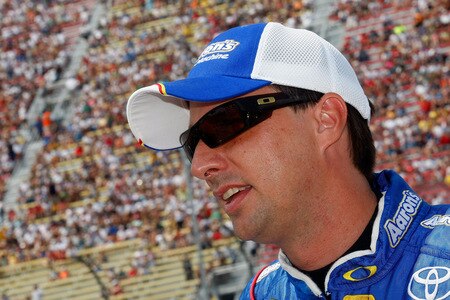 BROOKLYN, MI - AUGUST 16:  David Reutimann, driver of the Aaron's Dream Machine Toyota, looks on from the grid during the NASCAR Sprint Cup Series CARFAX 400 at Michigan International Speedway on August 16, 2009 in Brooklyn, Michigan.  <br /><br /><span class="help">(Photo by Jason Smith/Getty Images)</span>