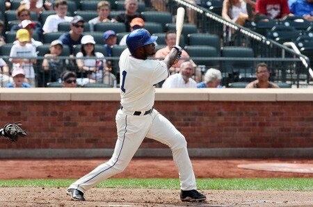 NEW YORK - AUGUST 16:  Luis Castillo #1 of the New York Mets follows through on his fifth inning two run home run against the San Francisco Giants on August 16, 2009 at Citi Field in the Flushing neighborhood of the Queens borough of New York City.  <br /><br /><span class="help">(Photo by Jim McIsaac/Getty Images)</span>