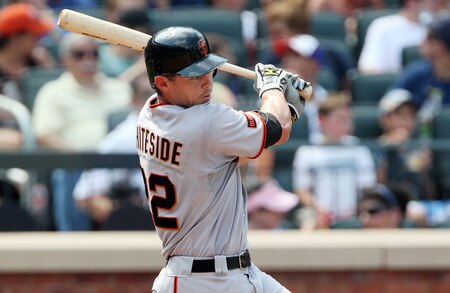 NEW YORK - AUGUST 16:  Eli Whiteside #22 of the San Francisco Giants hits a fifth inning single against the New York Mets on August 16, 2009 at Citi Field in the Flushing neighborhood of the Queens borough of New York City.  <br /><br /><span class="help">(Photo by Jim McIsaac/Getty Images)</span>