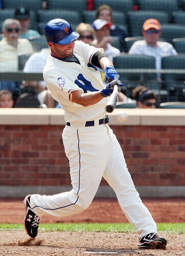NEW YORK - AUGUST 16:  Jeff Francoeur #12 of the New York Mets connects for a ninth inning base hit against the San Francisco Giants on August 16, 2009 at Citi Field in the Flushing neighborhood of the Queens borough of New York City.  <br /><br /><span class="help">(Photo by Jim McIsaac/Getty Images)</span>