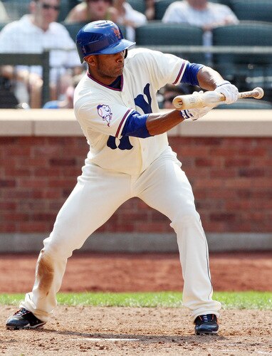 NEW YORK - AUGUST 16:  Fernando Tatis #17 of the New York Mets connects on a sacrifice bunt in the ninth inning against the San Francisco Giants on August 16, 2009 at Citi Field in the Flushing neighborhood of the Queens borough of New York City.  <br /><br /><span class="help">(Photo by Jim McIsaac/Getty Images)</span>