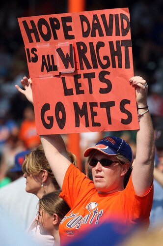NEW YORK - AUGUST 16:  A fan of the New York Mets holds a banner in reference to injured player David Wright during the game against the San Francisco Giants on August 16, 2009 at Citi Field in the Flushing neighborhood of the Queens borough of New York City.  <br /><br /><span class="help">(Photo by Jim McIsaac/Getty Images)</span>