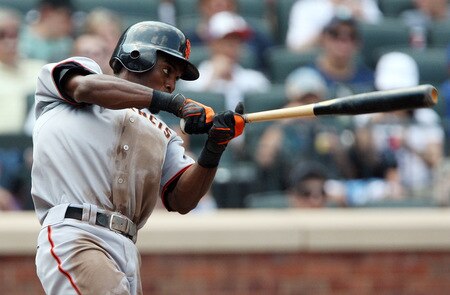 NEW YORK - AUGUST 16:  Eugenio Velez #8 of the San Francisco Giants follows through on a fifth inning RBI single against the New York Mets on August 16, 2009 at Citi Field in the Flushing neighborhood of the Queens borough of New York City.  <br /><br /><span class="help">(Photo by Jim McIsaac/Getty Images)</span>