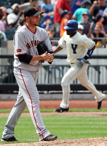 NEW YORK - AUGUST 16:  Jonathan Sanchez #57 of the San Francisco Giants looks on after surrendering a fifth inning home run against Luis Castillo #1 of the New York Mets on August 16, 2009 at Citi Field in the Flushing neighborhood of the Queens borough of New York City.  <br /><br /><span class="help">(Photo by Jim McIsaac/Getty Images)</span>