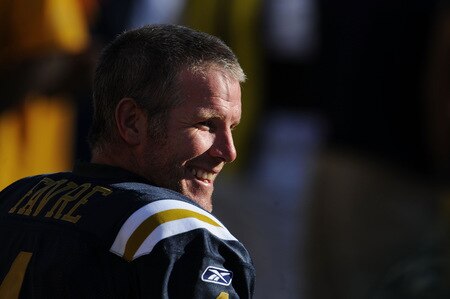 EAST RUTHERFORD, NJ - OCTOBER 12:  (FILE PHOTO) Brett Favre #4 of the New York Jets smiles from the sideline at the end of the Jets 26-14 win against the Cincinnati Bengals on October 12, 2008 at Giants Stadium in East Rutherford, New Jersey.  Favre is likely to sign a two-year deal worth between $10 and $12 million with the Minnesota Vikings. <br /><br /><span class="help">(Photo by Al Bello/Getty Images)</span>