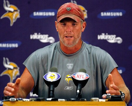 EDEN PRAIRIE, MN - AUGUST 18: Brett Favre talks with the media after his first practice with the Minnesota Vikings on August 18, 2009 at Winter Park in Eden Prairie, Minnesota.  <br /><br /><span class="help">(Photo by Scott A. Schneider/Getty Images)</span>