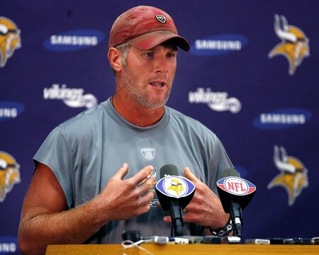 EDEN PRAIRIE, MN - AUGUST 18: Brett Favre talks with the media after his first practice with the Minnesota Vikings on August 18, 2009 at Winter Park in Eden Prairie, Minnesota.  <br /><br /><span class="help">(Photo by Scott A. Schneider/Getty Images)</span>