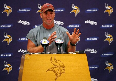 EDEN PRAIRIE, MN - AUGUST 18: Brett Favre talks with the media after his first practice with the Minnesota Vikings on August 18, 2009 at Winter Park in Eden Prairie, Minnesota.  <br /><br /><span class="help">(Photo by Scott A. Schneider/Getty Images)</span>