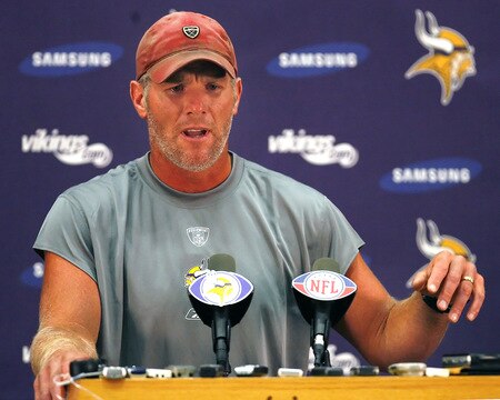 EDEN PRAIRIE, MN - AUGUST 18: Brett Favre talks with the media after his first practice with the Minnesota Vikings on August 18, 2009 at Winter Park in Eden Prairie, Minnesota.  <br /><br /><span class="help">(Photo by Scott A. Schneider/Getty Images)</span>