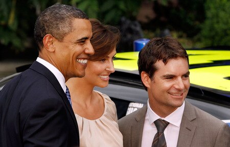 WASHINGTON - AUGUST 19:  U.S. President Barack Obama poses for a photograph with NASCAR driver Jeff Gordon and his wife Ingrid Vandebosch during an event honoring the 2008 Sprint Cup Champion Jimmie Johnson at the White House August 19, 2009 in Washington, DC. NASCAR drivers Carl Edwards, Greg Biffle, Clint Bowyer, Jeff Burton, Denny Hamlin, Tony Stewart and Dale Earnhardt Jr. also attended the ceremony.  <br /><br /><span class="help">(Photo by Chip Somodevilla/Getty Images)</span>