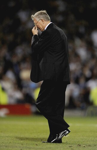 BURNLEY, ENGLAND - AUGUST 19:  Manchester United Manager Sir Alex Ferguson walks off the pitch after the Barclays Premier League match between Burnley and Manchester United at Turf Moor on August 19, 2009 in Burnley, England.  <br /><br /><span class="help">(Photoby Laurence Griffiths/Getty Images)</span>