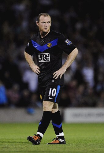 BURNLEY, ENGLAND - AUGUST 19:  Wayne Rooney of Manchester United looks dejected during the Barclays Premier League match between Burnley and Manchester United at Turf Moor on August 19, 2009 in Burnley, England.  <br /><br /><span class="help">(Photoby Laurence Griffiths/Getty Images)</span>