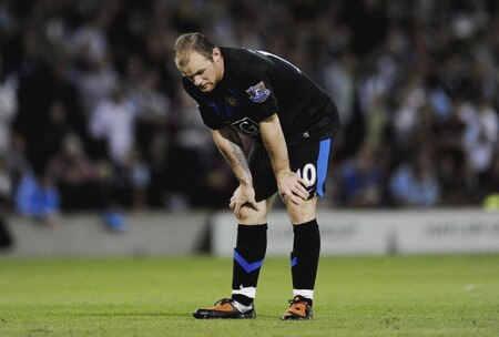 BURNLEY, ENGLAND - AUGUST 19:  Wayne Rooney of Manchester United looks dejected after the Barclays Premier League match between Burnley and Manchester United at Turf Moor on August 19, 2009 in Burnley, England.  <br /><br /><span class="help">(Photoby Laurence Griffiths/Getty Images)</span>