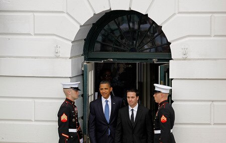 WASHINGTON - AUGUST 19:  U.S. President Barack Obama and 2008 Sprint Cup Champion Jimmie Johnson walk out of the White House ahead of a ceremony honoring Johnson August 19, 2009 in Washington, DC. NASCAR drivers Carl Edwards, Greg Biffle, Clint Bowyer, Jeff Burton, Jeff Gordon, Denny Hamlin, Tony Stewart and Dale Earnhardt Jr. also attended the ceremony.  <br /><br /><span class="help">(Photo by Chip Somodevilla/Getty Images)</span>