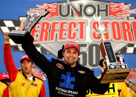 BRISTOL, TN - AUGUST 19:  Donny Lia, driver of the #4 Mystic Missel Dodge celebrates in Victory Lane with his crew after winning the NASCAR Whelen Modified Tour at Bristol Motor Speedway on August 19, 2009 in Bristol, Tennessee.  <br /><br /><span class="help">(Photo by Rusty Jarrett/Getty Images for NASCAR)</span>