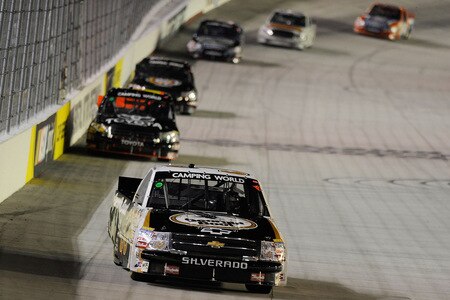 BRISTOL, TN - AUGUST 19: Ron Hornaday Jr. driver of the #33 Georgia Boot Chevrolet leads a pack of trucks into turn 1  during the NASCAR Camping World Truck Series O'Reilly 200 at Bristol Motor Speedway on August 19, 2009 in Bristol, Tennessee.  <br /><br /><span class="help">(Photo by John Harrelson/Getty Images for NASCAR)</span>