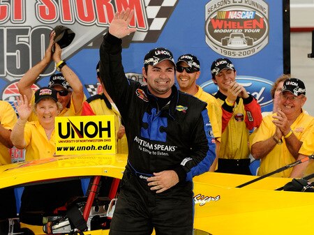 BRISTOL, TN - AUGUST 19:  Donny Lia, driver of the #4 Mystic Missel Dodge celebrates in Victory Lane with his crew after winning the NASCAR Whelen Modified Tour at Bristol Motor Speedway on August 19, 2009 in Bristol, Tennessee.  <br /><br /><span class="help">(Photo by Rusty Jarrett/Getty Images for NASCAR)</span>