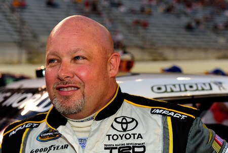 BRISTOL, TN - AUGUST 19:  Todd Bodine, driver of the #30 Ventrilo Toyota stands next to his truck prior to the start of the NASCAR Camping World Truck Series O'Reilly 200 at Bristol Motor Speedway on August 19, 2009 in Bristol, Tennessee.  <br /><br /><span class="help">(Photo by Rusty Jarrett/Getty Images for NASCAR)</span>