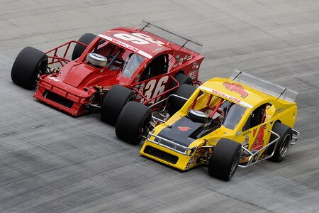 BRISTOL, TN - AUGUST 19:  Donny Lia driver of the #4 Mystic Missile Dodge and Ted Christopher driver of the #36 A1-Lee Installations Chevrolet race for the lead duirng the NASCAR Whelen Modified Tour at Bristol Motor Speedway on August 19, 2009 in Bristol, Tennessee.  <br /><br /><span class="help">(Photo by John Harrelson/Getty Images for NASCAR)</span>