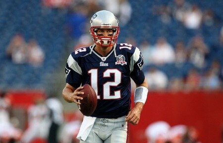 FOXBORO, MA - AUGUST 20:  Tom Brady #12 of the New England Patriots runs on the field during warm ups against the Cincinnati Bengals during their preseason game at Gillette Stadium on August 20, 2009 in Foxboro, Massachusetts.  <br /><br /><span class="help">(Photo by Jim Rogash/Getty Images)</span>