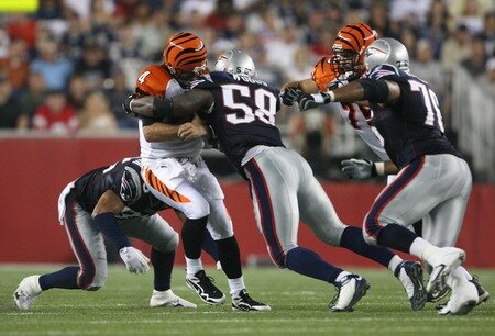 FOXBORO, MA - AUGUST 20:  Pierre Woods #58 of the New England Patriots sacks quarterback J.T. O'Sullivan #4 of the Cincinnati Bengals during their preseason game at Gillette Stadium on August 20, 2009 in Foxboro, Massachusetts.  <br /><br /><span class="help">(Photo by Jim Rogash/Getty Images)</span>