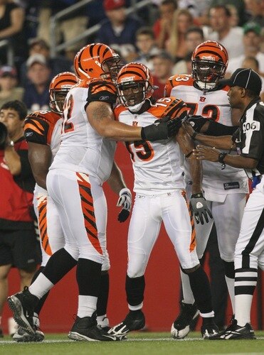 FOXBORO, MA - AUGUST 20:  Chris Henry #15 of the Cincinnati Bengals celebrates with his teammates after he scored on a 24-yard touchdown reception in the second quarter against the New England Patriots during their preseason game at Gillette Stadium on August 20, 2009 in Foxboro, Massachusetts.  <br /><br /><span class="help">(Photo by Jim Rogash/Getty Images)</span>