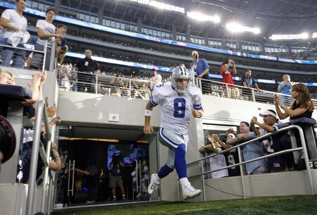 ARLINGTON, TX - AUGUST 21:  Quarterback Tony Romo #9 of the Dallas Cowboys takes to the field against the Tennessee Titans prior to a preseason game at Cowboys Stadium on August 21, 2009 in Arlington, Texas. <br /><br /><span class="help">(Photo by Tom Pennington/Getty Images)</span>
