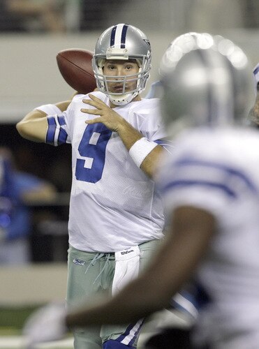 ARLINGTON, TX - AUGUST 21:  Quarterback Tony Romo #9 of the Dallas Cowboys throws the ball in the first quarter against the Tennessee Titans during a preseason game at Dallas Cowboys Stadium on August 21, 2009 in Arlington, Texas. <br /><br /><span class="help">(Photo by Tom Pennington/Getty Images)</span>